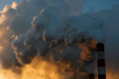 FILE PHOTO: Smoke and steam billows from Belchatow Power Station, Europe’s largest coal-fired power plant operated by PGE Group, near Belchatow