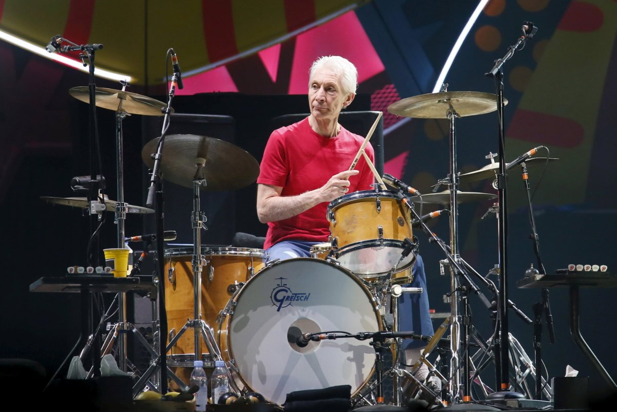 FILE PHOTO: Charlie Watts of British veteran rockers The Rolling Stones performs with his band members Mick Jagger, Keith Richards, and Ronnie Wood during a concert on their “Latin America Ole Tour” in Santiago