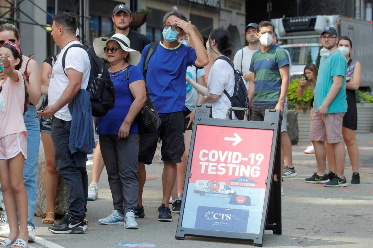 People line up at a coronavirus disease (COVID-19) testing at a mobile testing van in New York