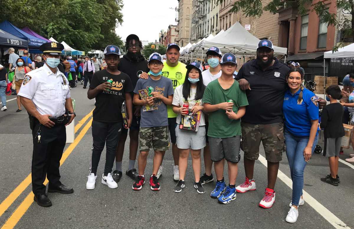 Cops and community members together at the 7th Precinct National Night Out on the Lower East Side.
