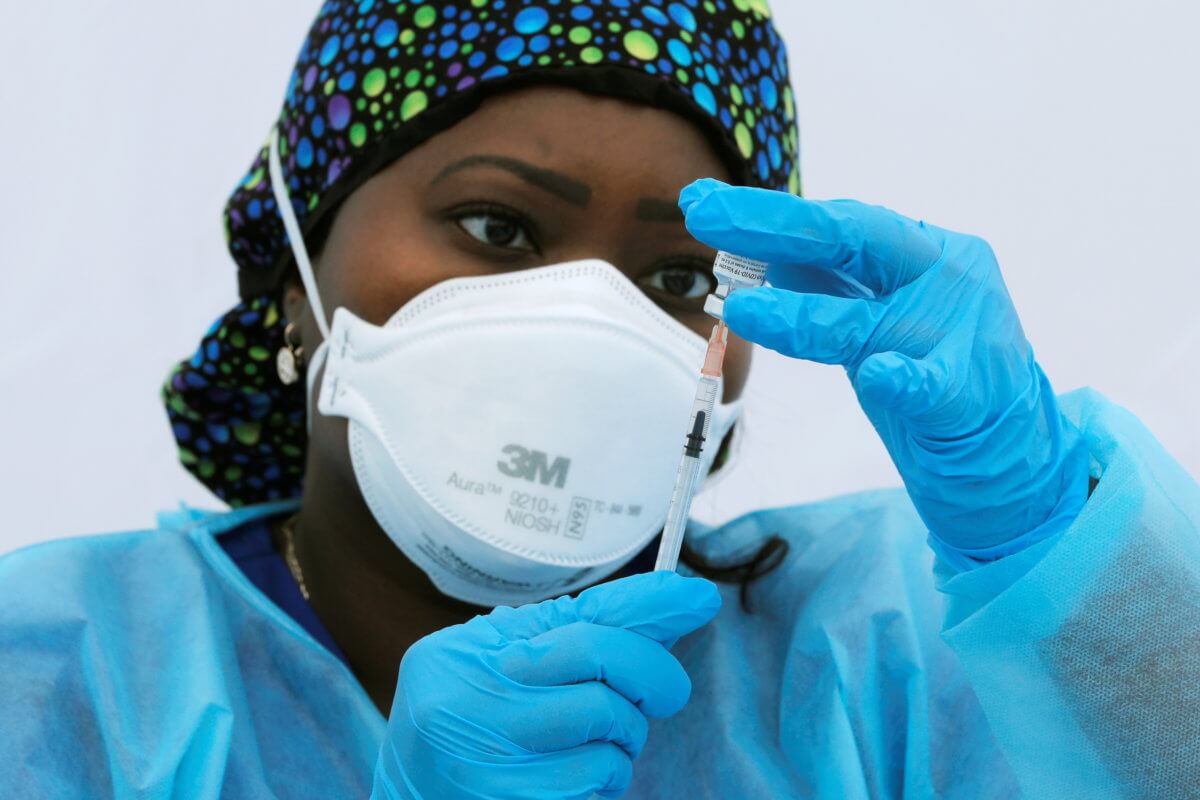 Coronavirus disease (COVID-19) vaccination event outside the Bronx Writing Academy school in New York City