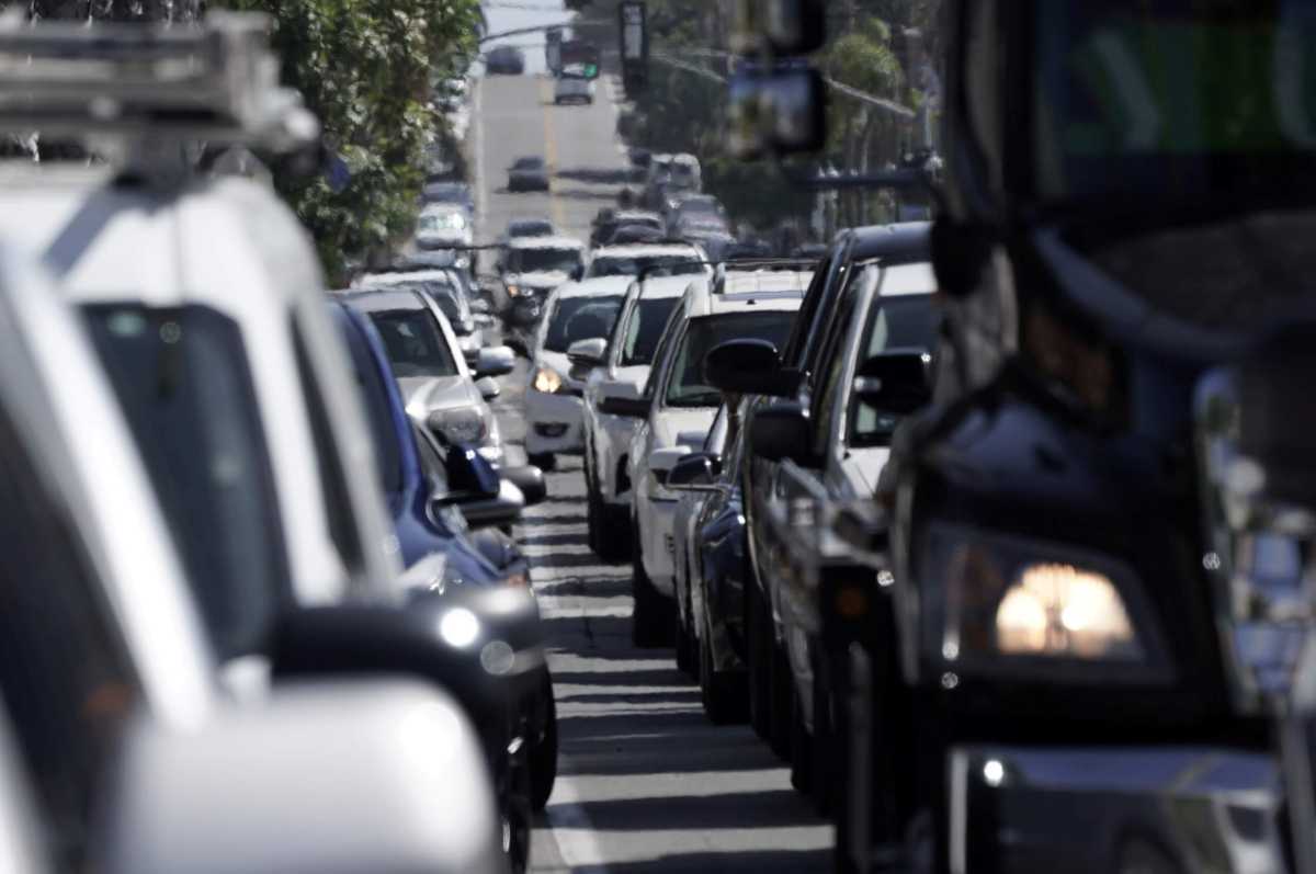 FILE PHOTO: People crowd San Diego beaches on July Fourth weekend