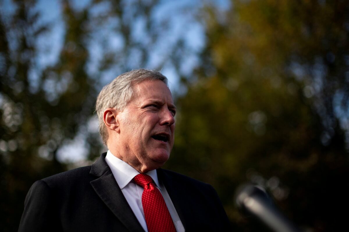 FILE PHOTO: White House Chief of Staff Mark Meadows speaks to reporters following a television interview, outside the White House