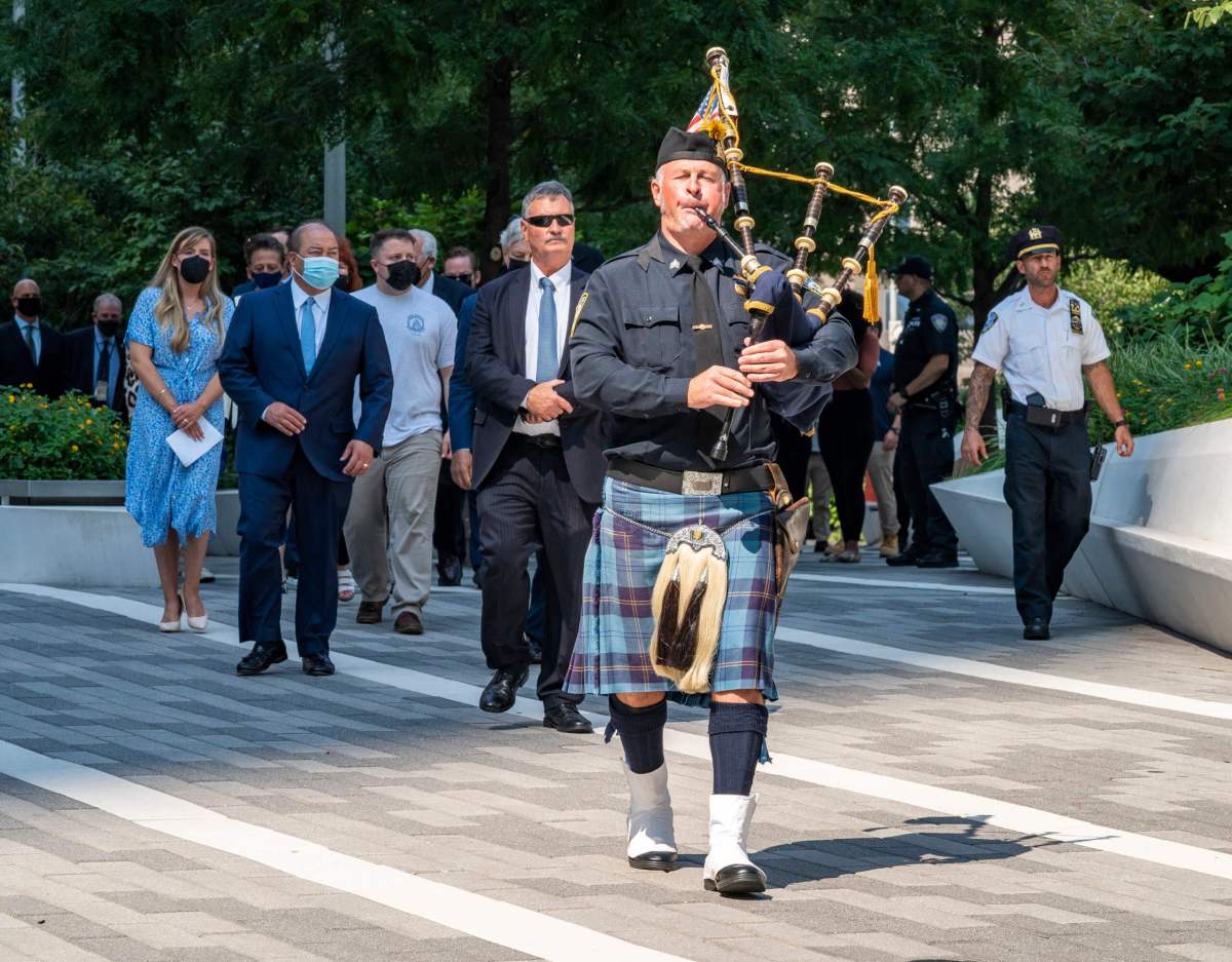 The first to respond on 9/11 continue bring closure to the wounded, 20 years later 3 member of The Port Authority Police Department Pipes and Drums Band plays at the Memorial Garden