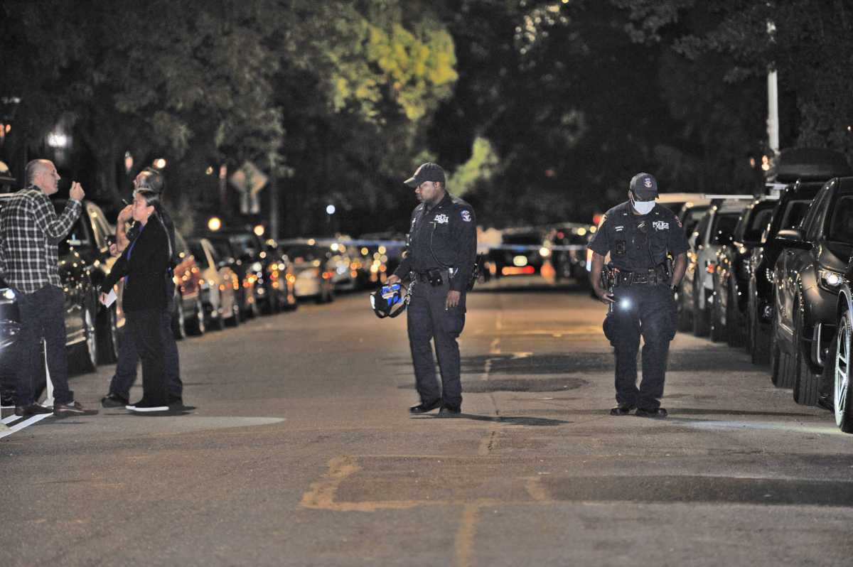 Police probe for clues in a fatal shooting at Monroe Street and Classon Avenue.