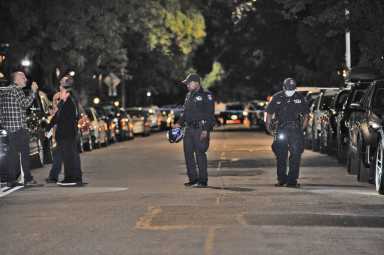 Police probe for clues in a fatal shooting at Monroe Street and Classon Avenue.