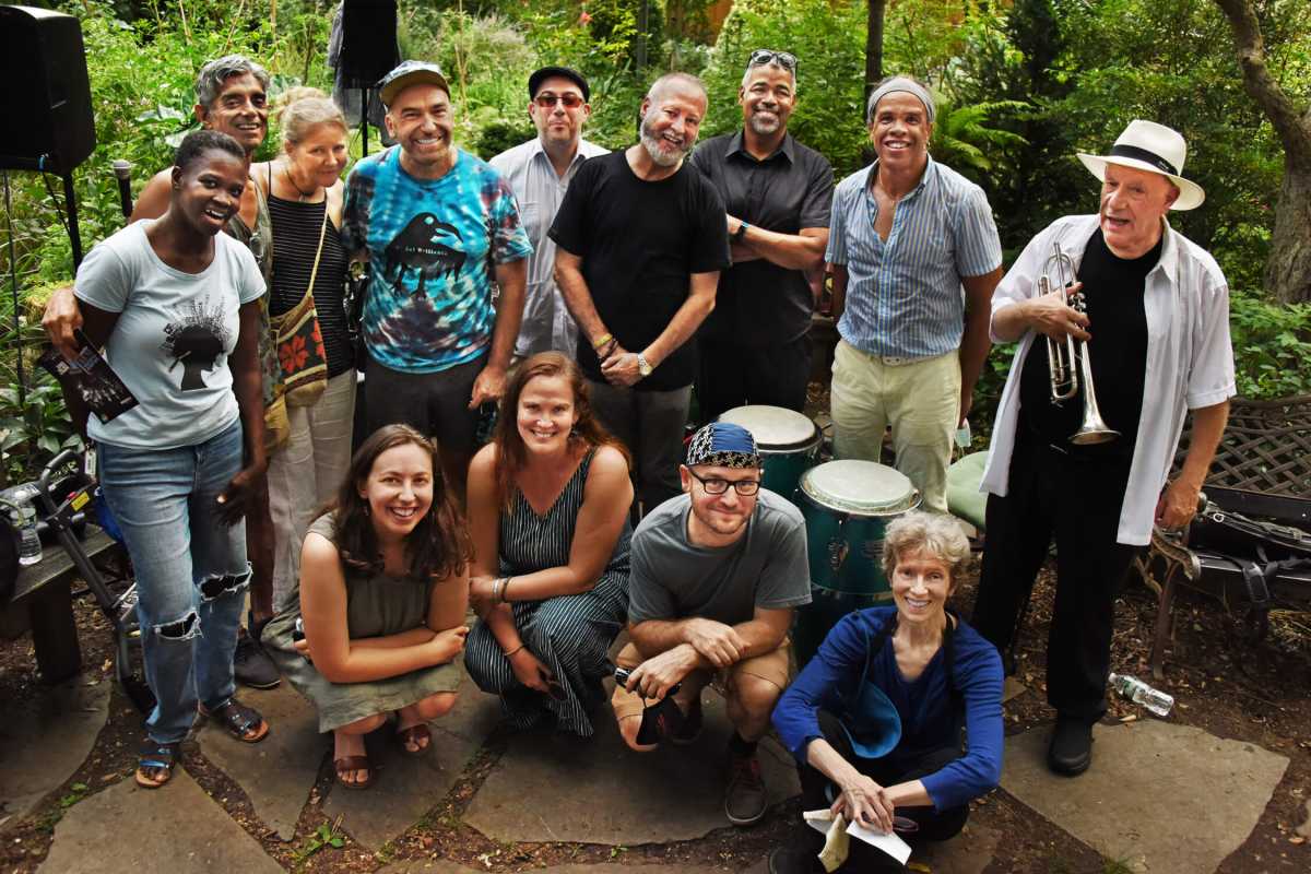 The band, the organizers, garden members.