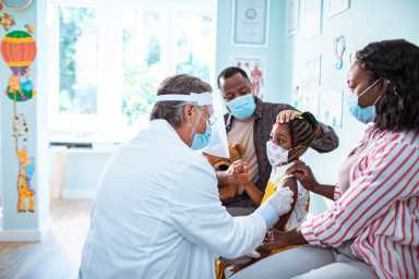 Little girl getting vaccinated