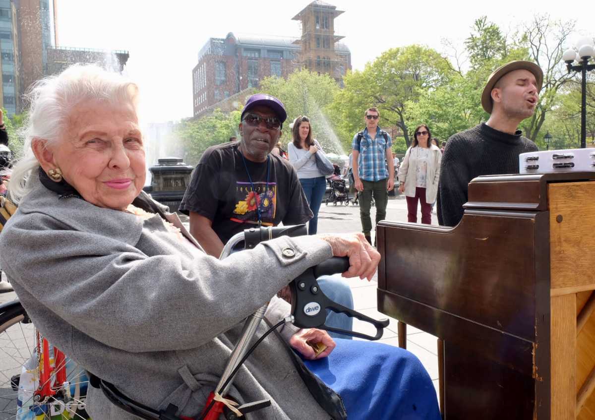 Doris stops to hear some of the parks musicians.