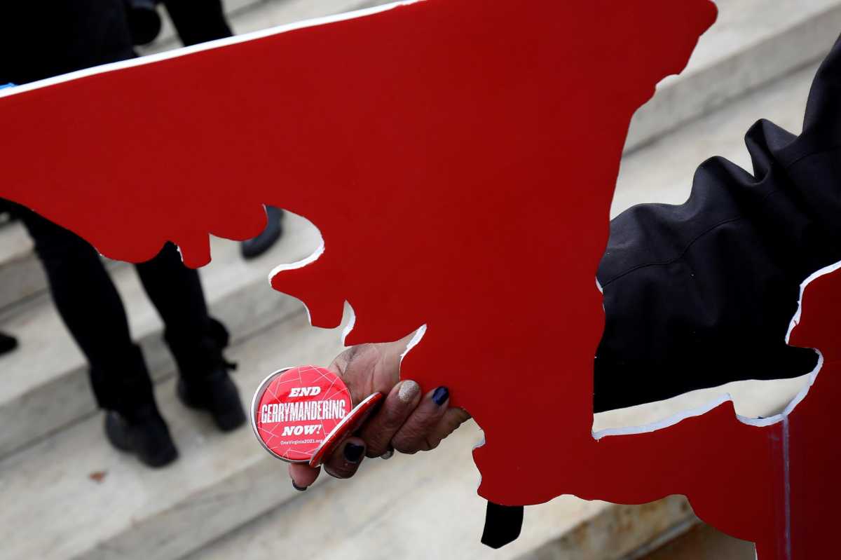 FILE PHOTO: Demonstrators rally in front of the Supreme court before oral arguments on Benisek v. Lamone in Washington