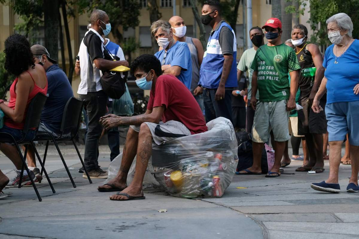 FILE PHOTO: Coronavirus disease (COVID-19) vaccination campaign for homeless people in Rio de Janeiro’s downtown