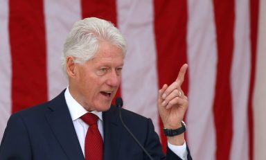 FILE PHOTO: Former U.S. President Bill Clinton speaks during a public memorial for Robert F. Kennedy at the 50th anniversary of his assassination at Arlington National Cemetery