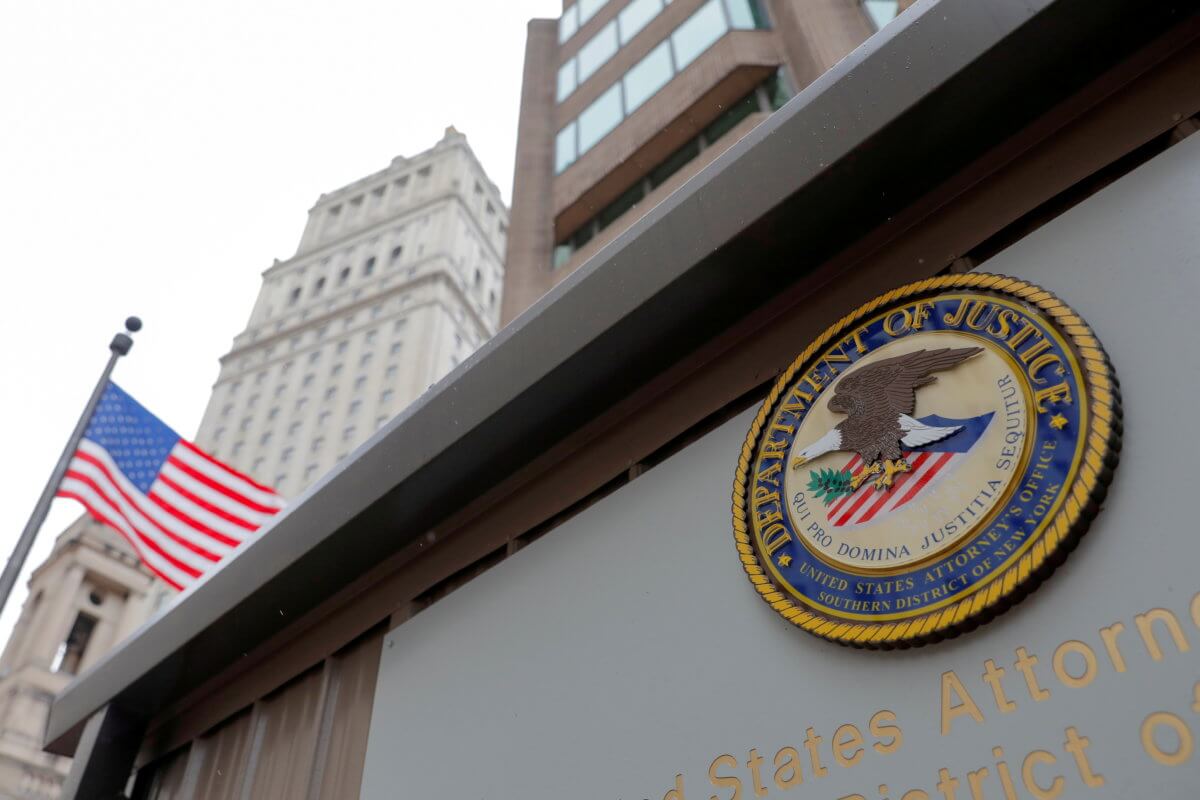 FILE PHOTO: The seal of the United States Department of Justice is seen on the building exterior of the United States Attorney’s Office of the Southern District of New York in Manhattan, New York City