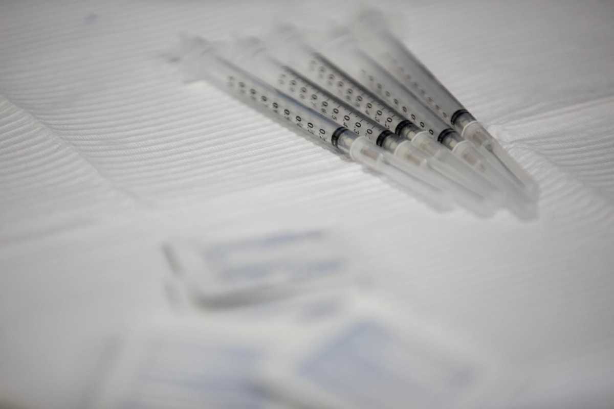 People receive COVID-19 booster vaccination in Michigan