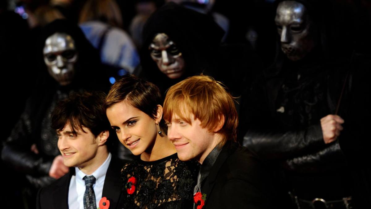 FILE PHOTO: Britain’s Watson, Radcliffe and Grint pose as they arrive for the world film premiere of “Harry Potter and the Deathly Hallows: Part 1” in London