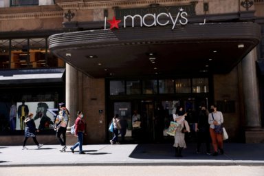FILE PHOTO: Shoppers are seen outside Macy’s in the Manhattan borough of New York City