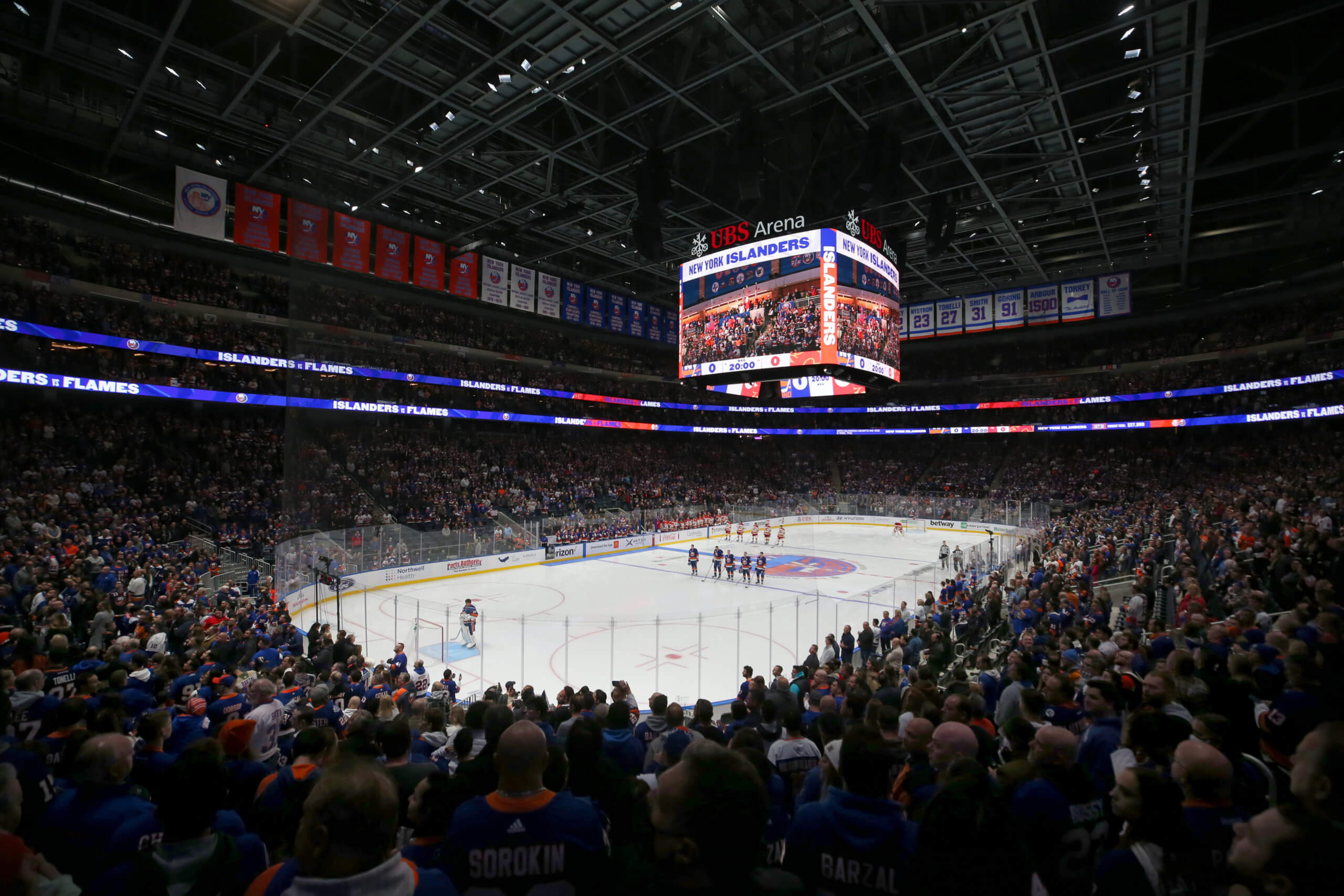 Flames spoil opening of Islanders' new arena