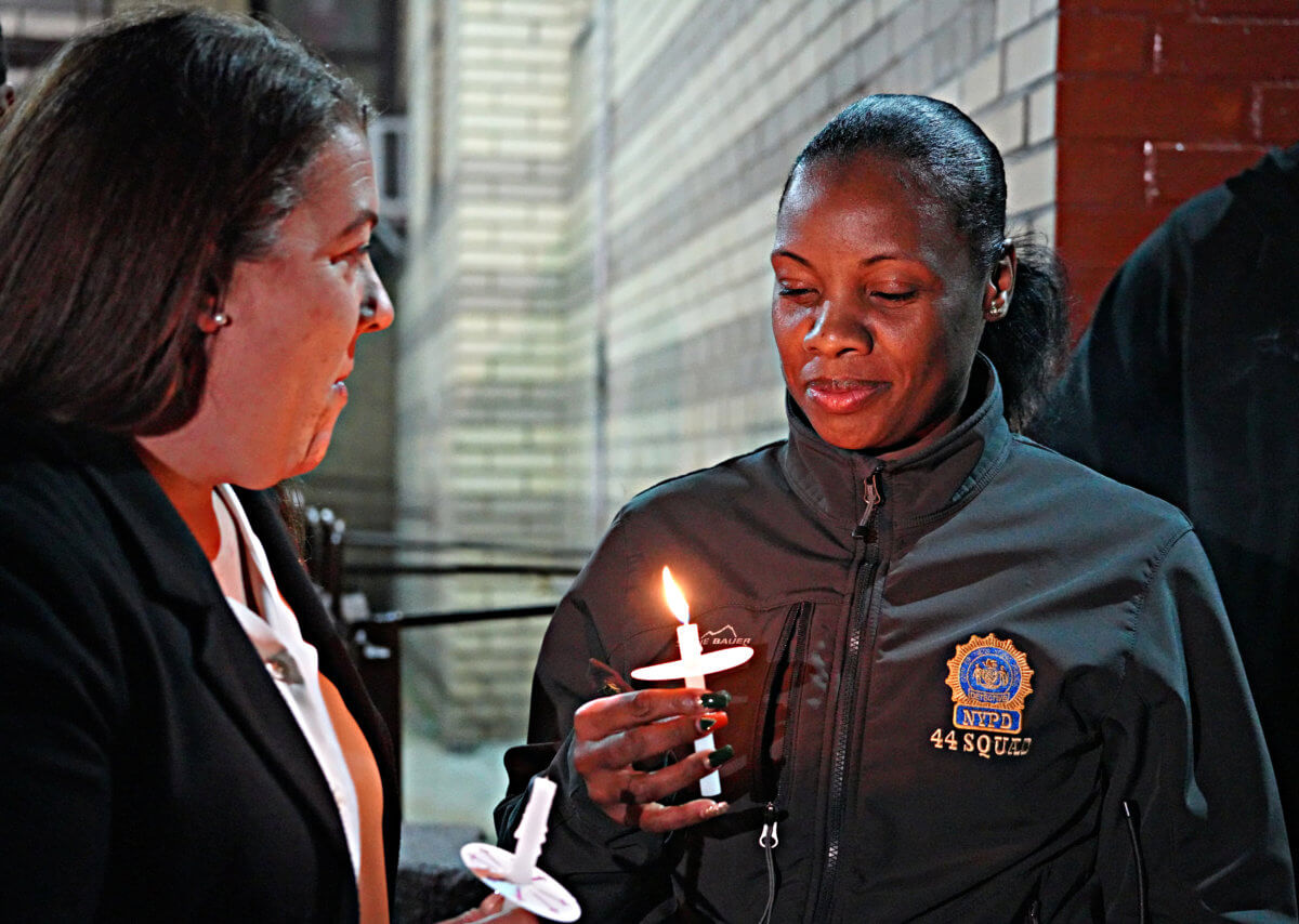 'We're never ever going to stop until we find out what happened': NYPD, Bronx residents holds vigil for infant twins murdered a year ago 9