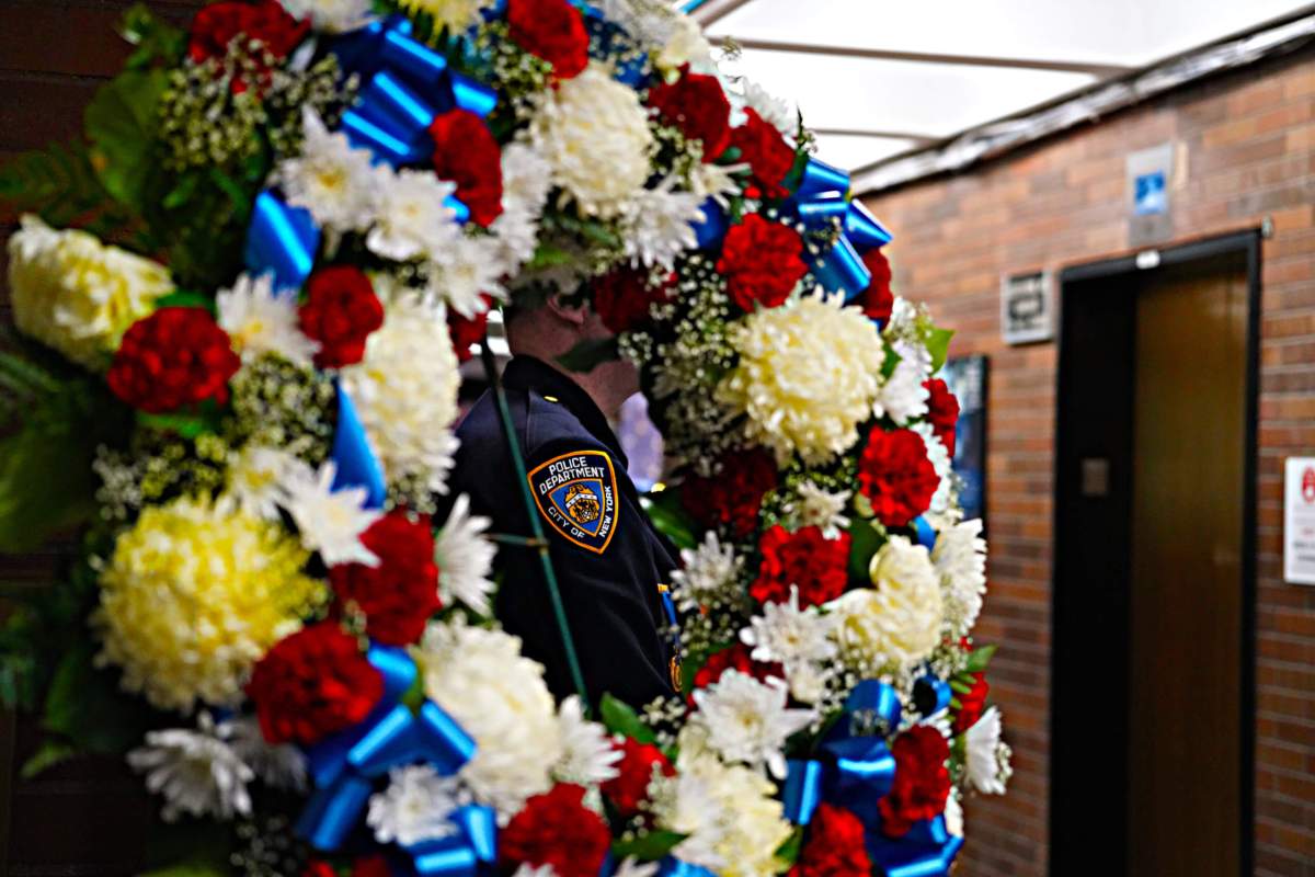 NYPD saluted fallen heroes with floral wreaths