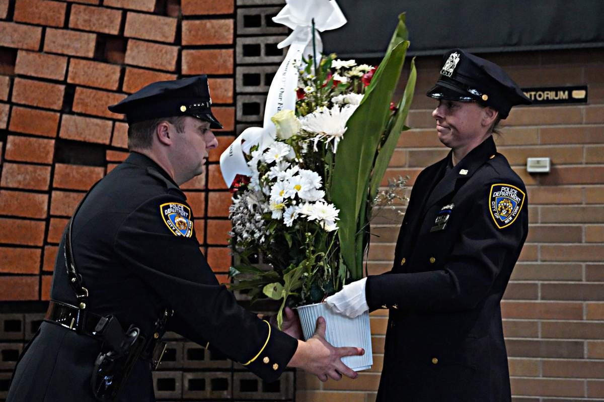End of watch: NYPD salutes heroes fallen from 9/11-related illnesses at somber Police Plaza ceremony 14 Flowers are presented in honor of those lost