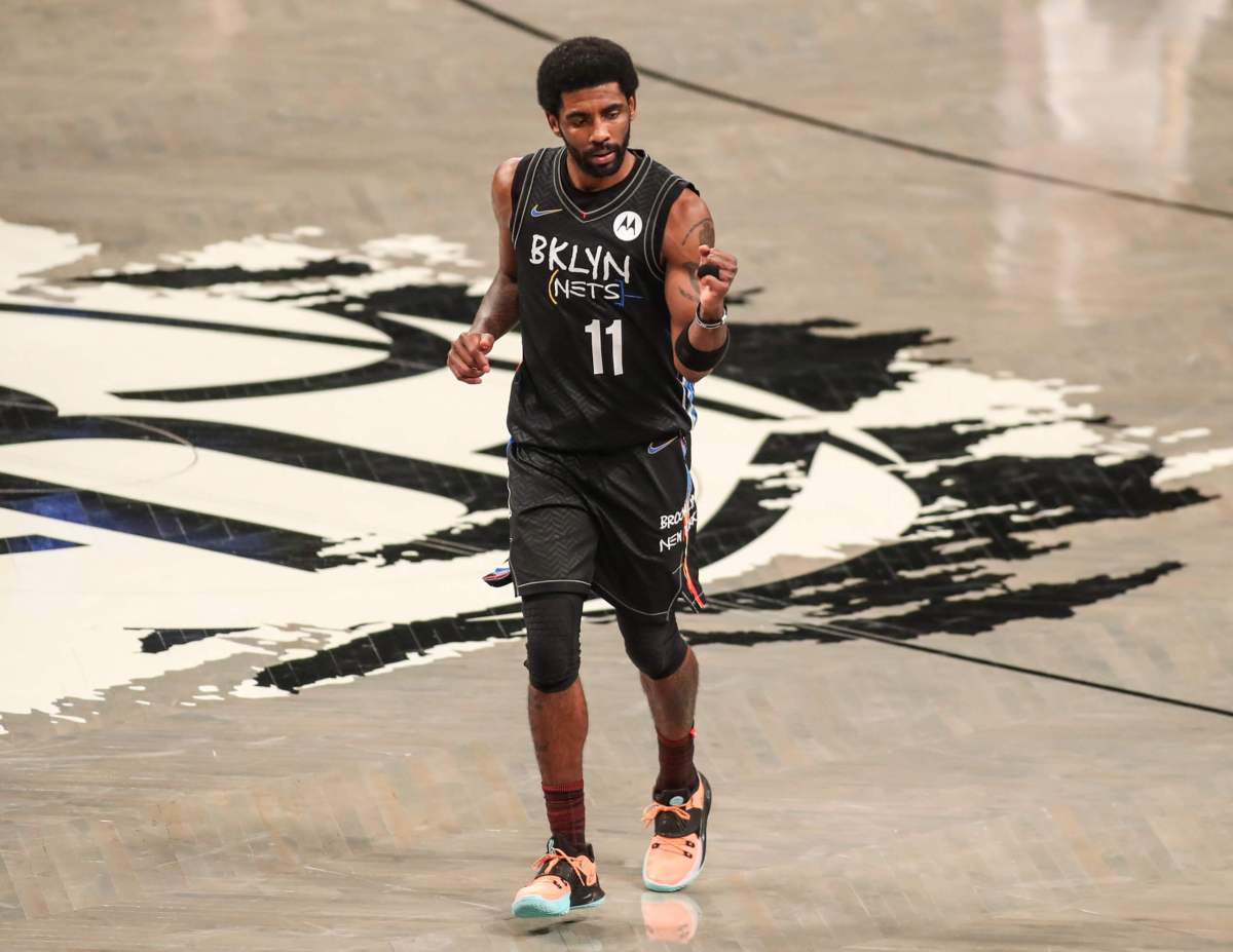 Nets' Kyrie Irving posts cryptic video lacing up sneakers as