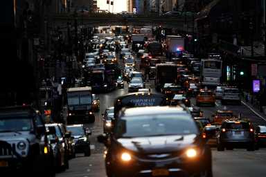 FILE PHOTO: Traffic is pictured at twilight along 42nd St. in Manhattan