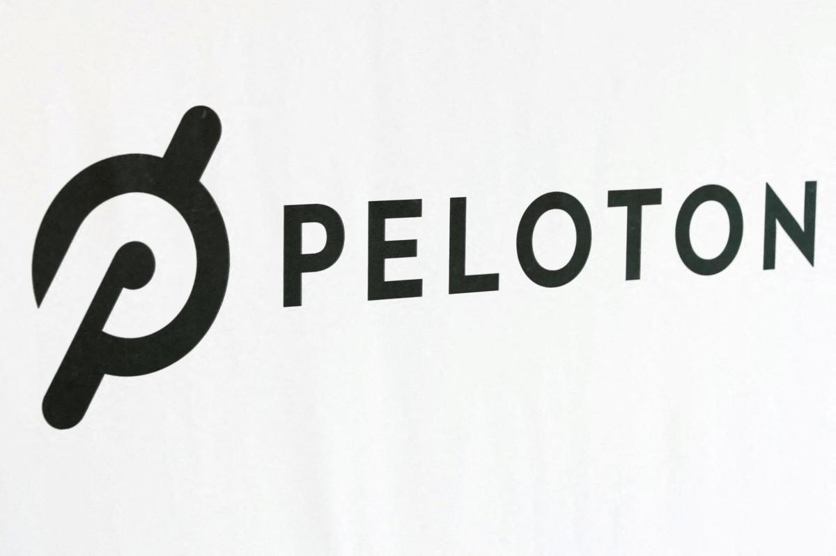 FILE PHOTO: A Peloton logo is seen after the ringing of the opening bell for the company’s IPO at the Nasdaq Market site in New York City