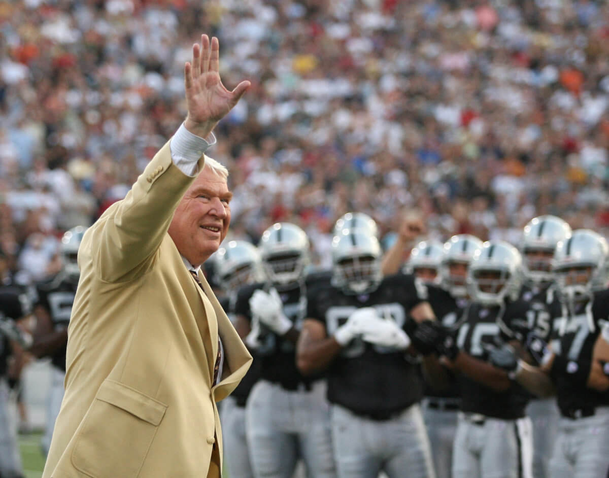 FILE PHOTO: Former Oakland Raiders’ coach John Madden waves to the crowd before the Hall of Fame game in Canton, Ohio