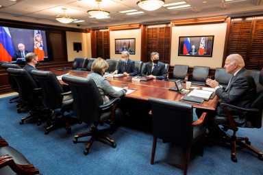 FILE PHOTO: U.S. President Joe Biden holds secure video call with Russia’s President Vladimir Putin from the White House in Washington