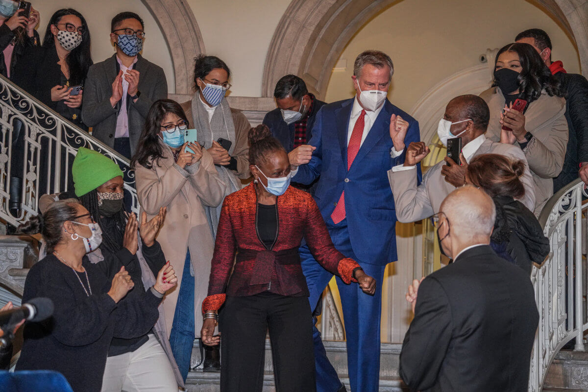 The long goodbye: Mayor de Blasio ducks the press and protesters at City Hall departure 13