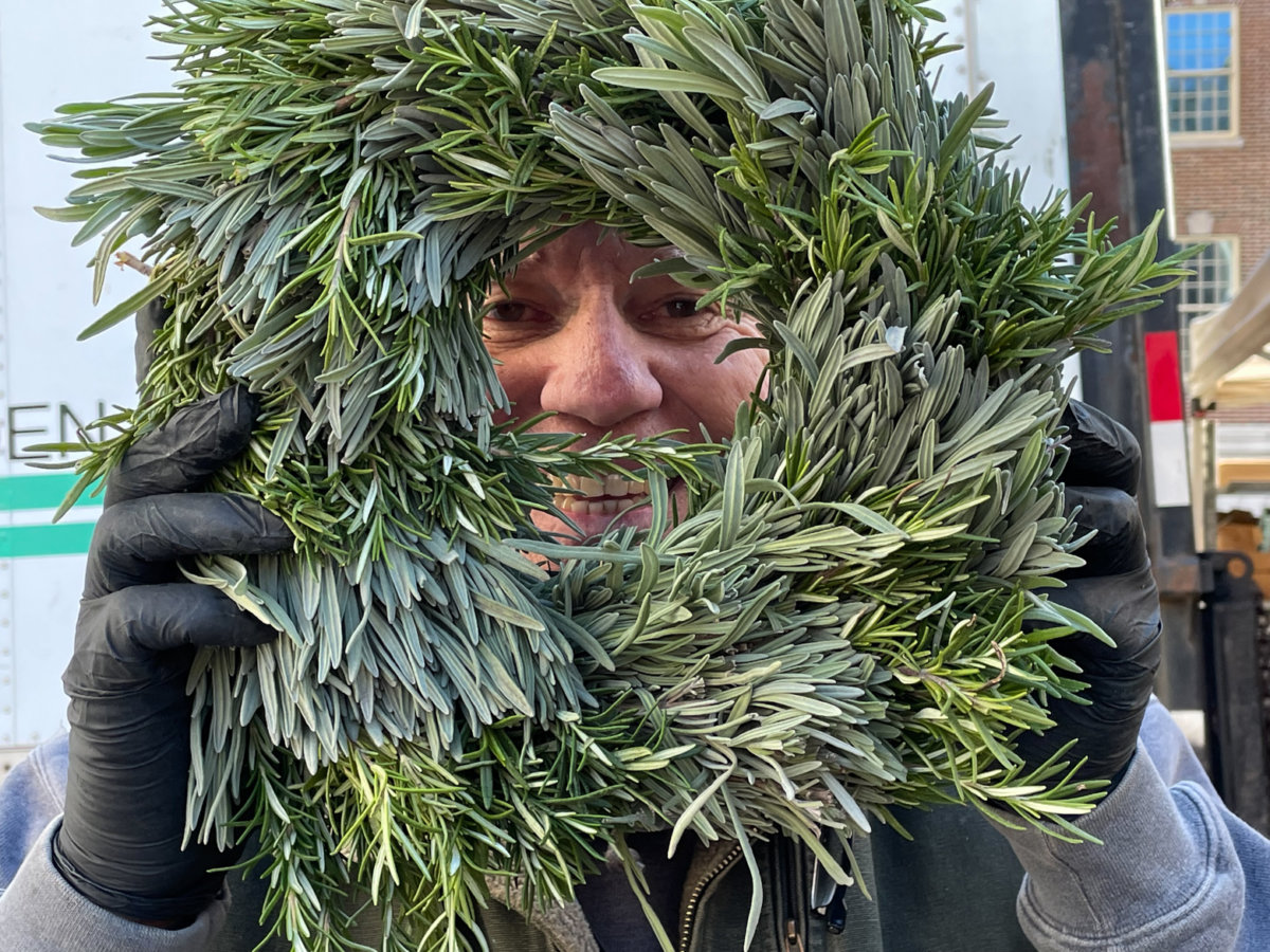Farmer Ron Binaghi and his aromatic wreath of rosemary and  lavender.