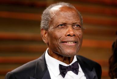 FILE PHOTO: Actor Sidney Poitier arrives at the 2014 Vanity Fair Oscars Party in West Hollywood