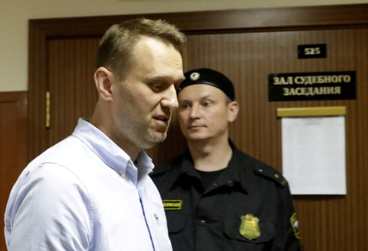 FILE PHOTO: Russian opposition leader Alexei Navalny arrives for a hearing for his appeal at a court in Moscow