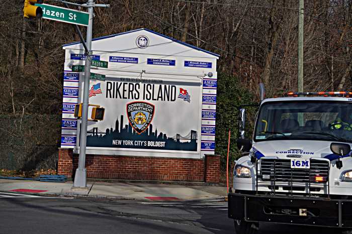 A DOC truck leaves Rikers Island.