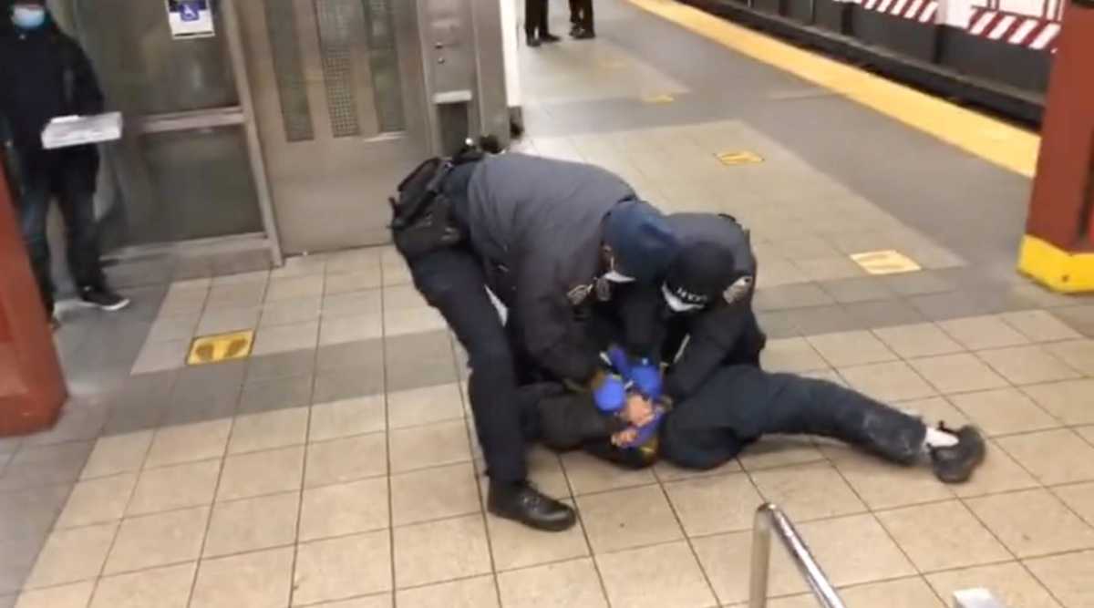 cops cuff man