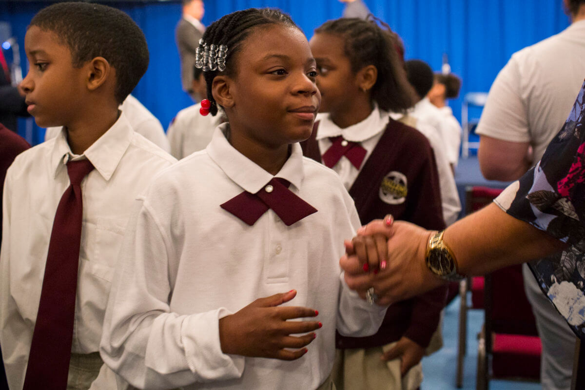 Students from the Challenge Preparatory Charter School are seen at the Far Rockaway Community Church of the Nazarene in recognition of the two-year landfall of Hurricane Sandy in New York