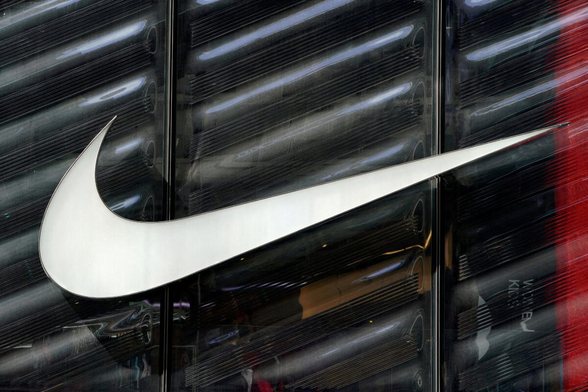 FILE PHOTO: The Nike swoosh logo is seen outside the store on 5th Avenue in New York