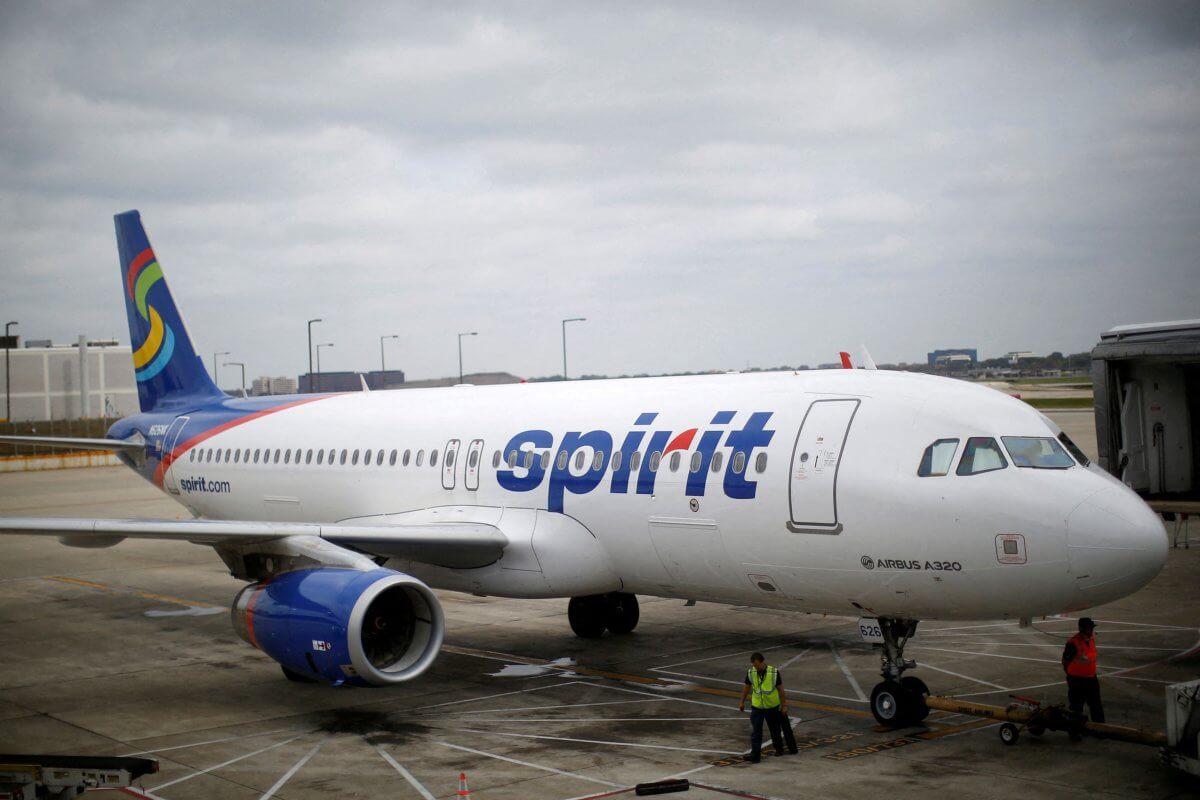 FILE PHOTO: A Spirit Airlines A320-200 airplane sits at a gate at the O’Hare Airport in Chicago, Illinois