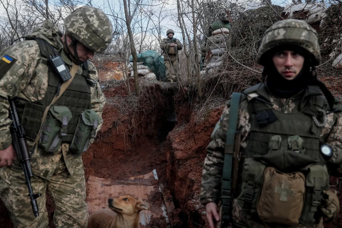 Ukrainian service members are seen on the front line near the city of Novoluhanske