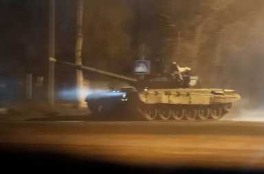 How Western sanctions might target Russia after Ukraine invasion 36 A tank drives along a street in Donetsk