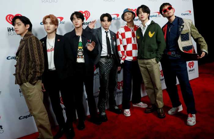 BTS poses at the carpet during arrivals ahead of iHeartRadio Jingle Ball concert at The Forum, in Inglewood, California, U.S., December 3, 2021.