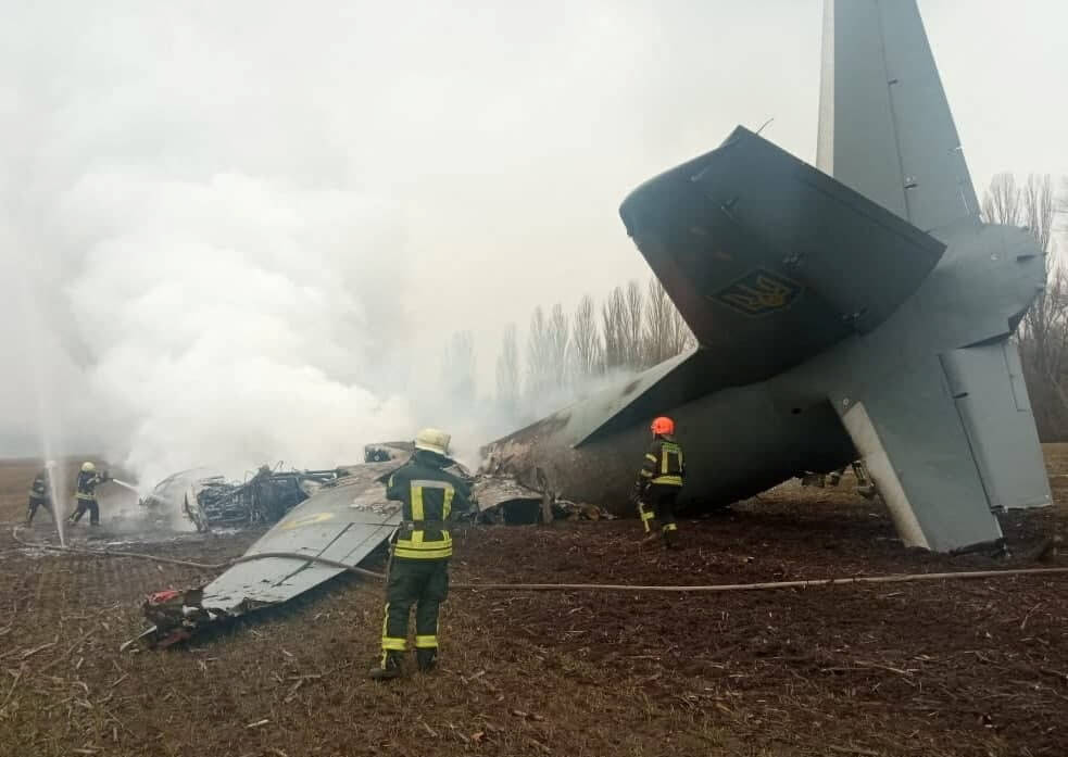 Rescuers work at the crash site of the Ukrainian Armed Forces’ Antonov aircraft in Kyiv region