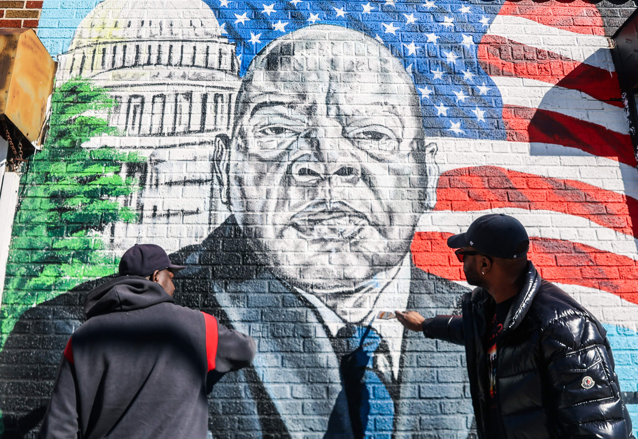 Artist, East Flatbush community celebrates John Lewis’ birthday with