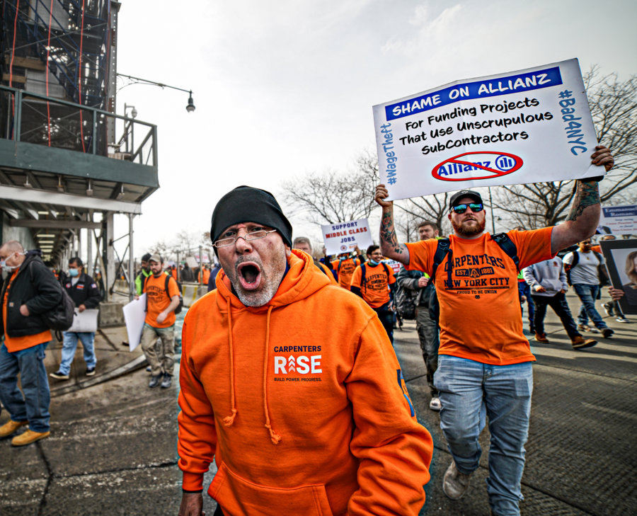 Hundreds of union employees protest alleged exploitative working ...