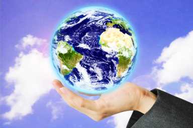 Hand hold the earth on the sky