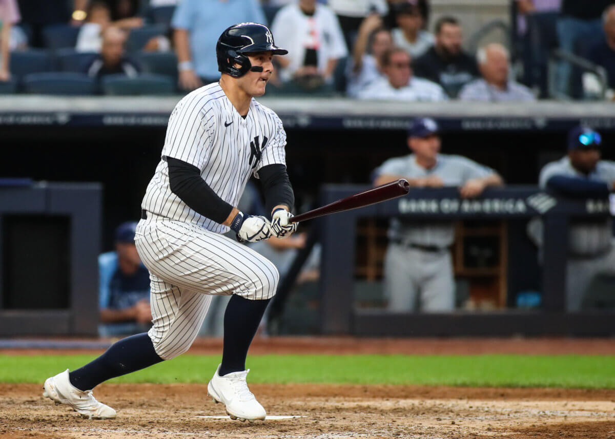 Yankees free agent first baseman Anthony Rizzo swings at Yankee Stadium.