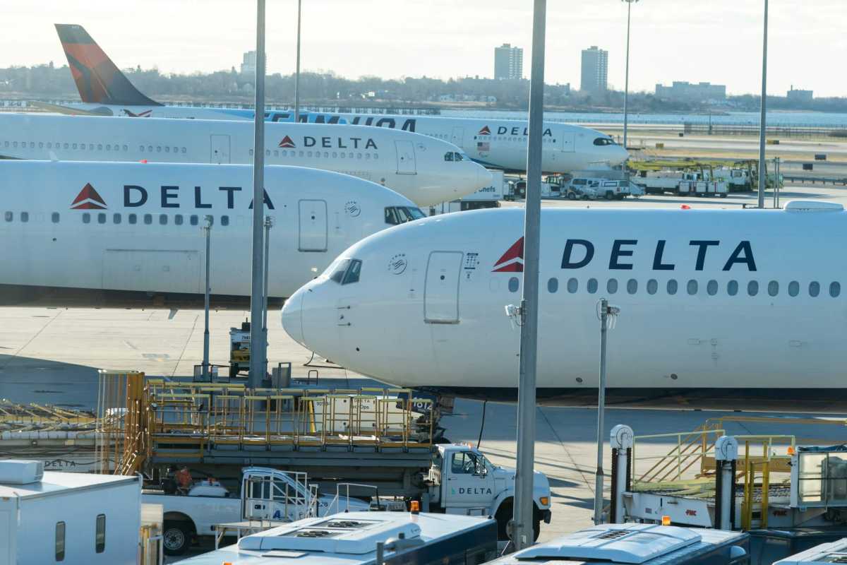 Passengers line up at John F. Kennedy International Airport in New York