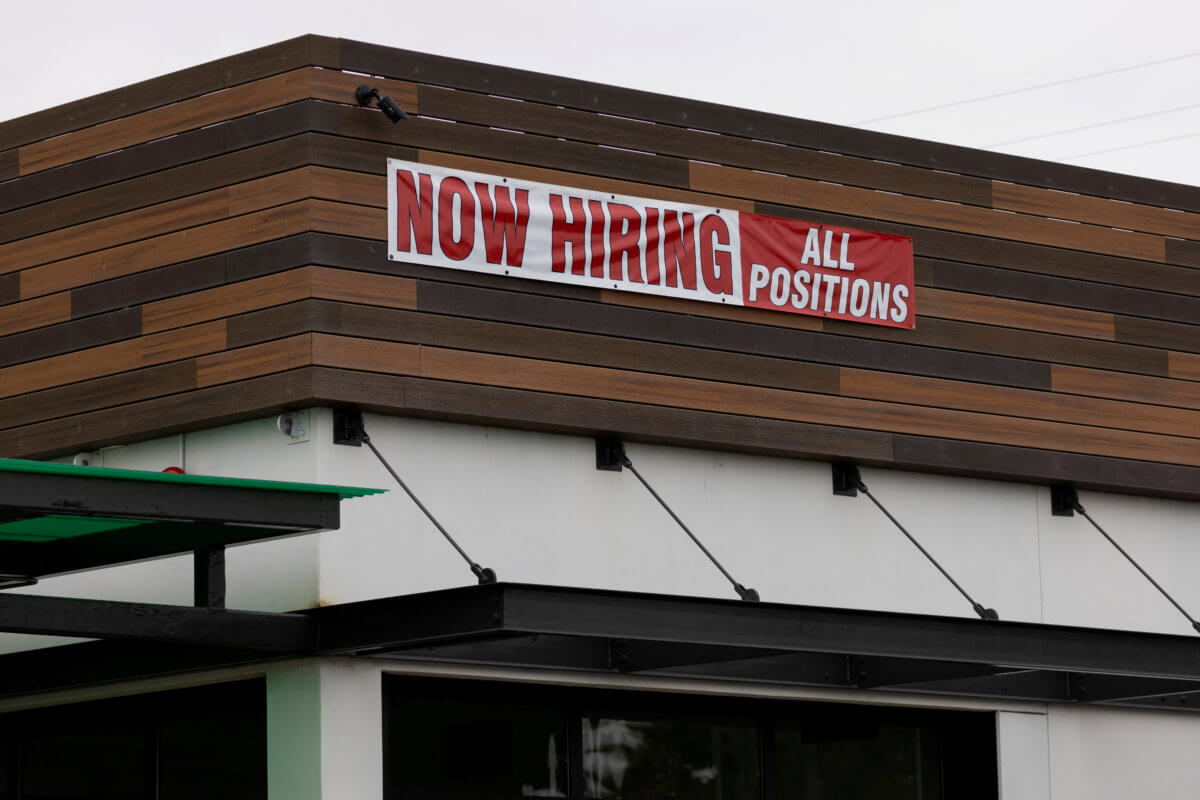 FILE PHOTO: A restaurant advertising jobs looks to attract workers in Oceanside, California