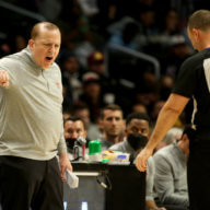 Knicks coach Tom Thibodeau argues with a referee over a call.