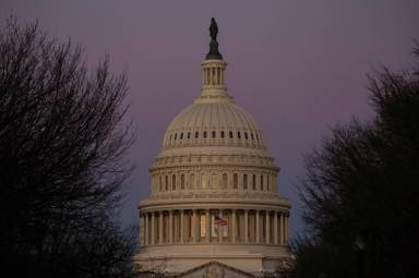FILE PHOTO: A view of the U.S. Capitol building as the sunrises in Washington